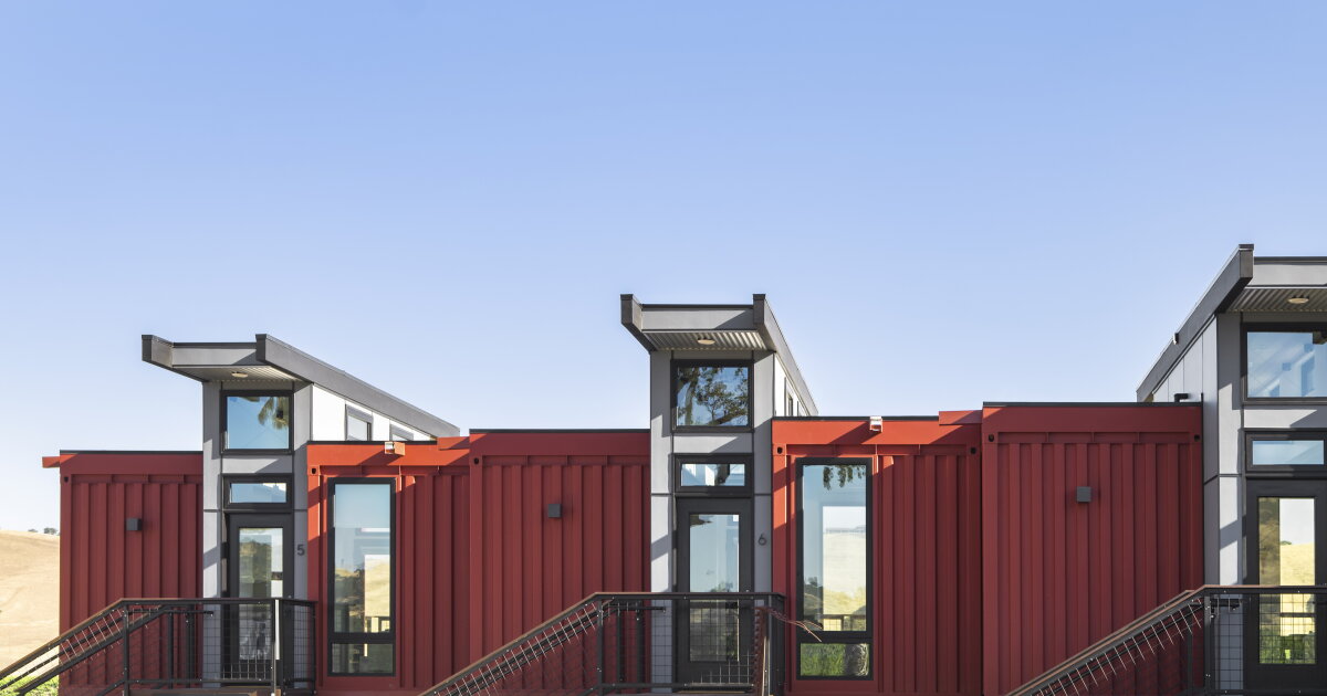 Shipping container hotel raises the roof for light and air