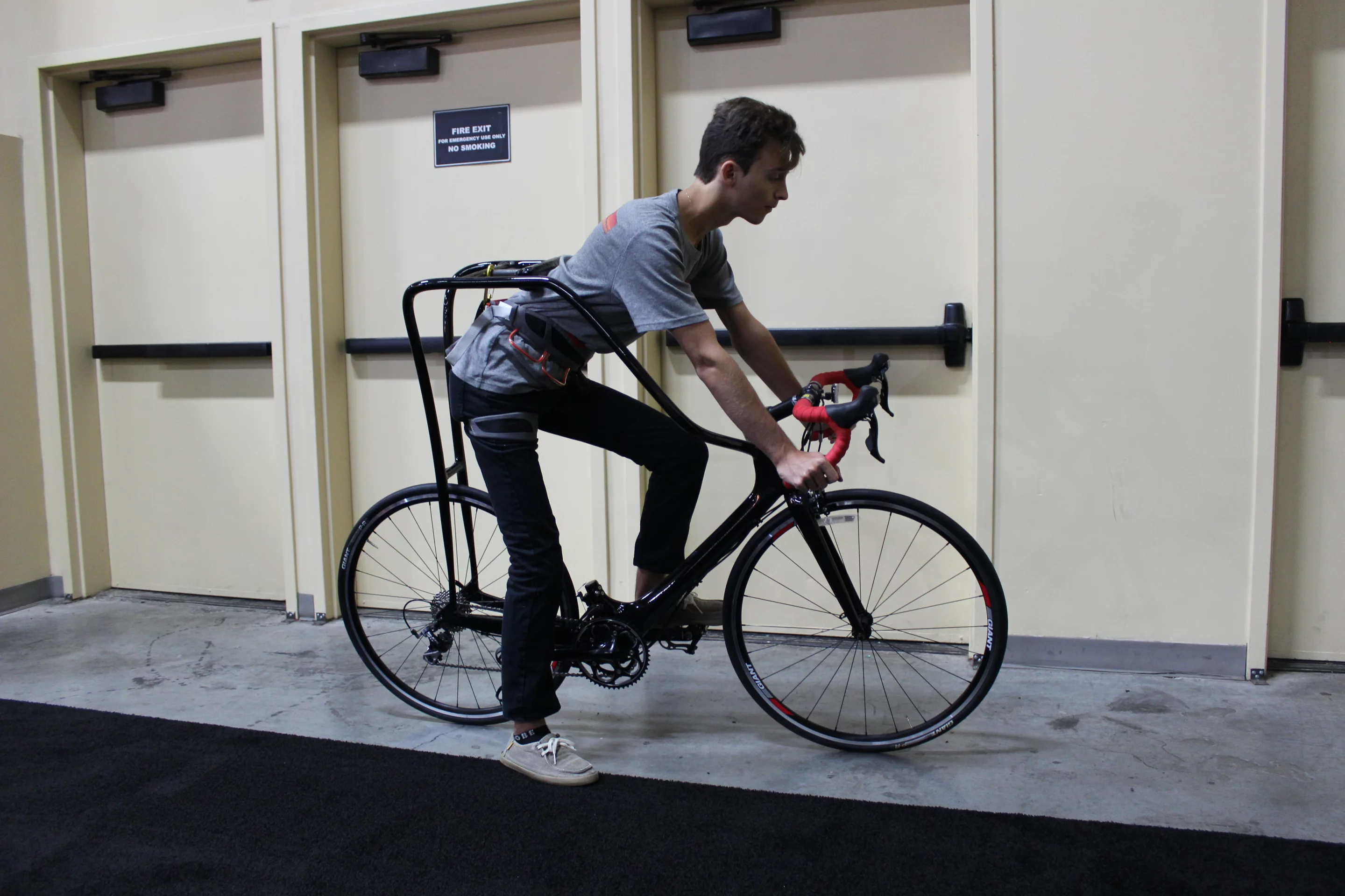 Inventor David Schwartz's son Daniel shows us the Flying Rider at Interbike