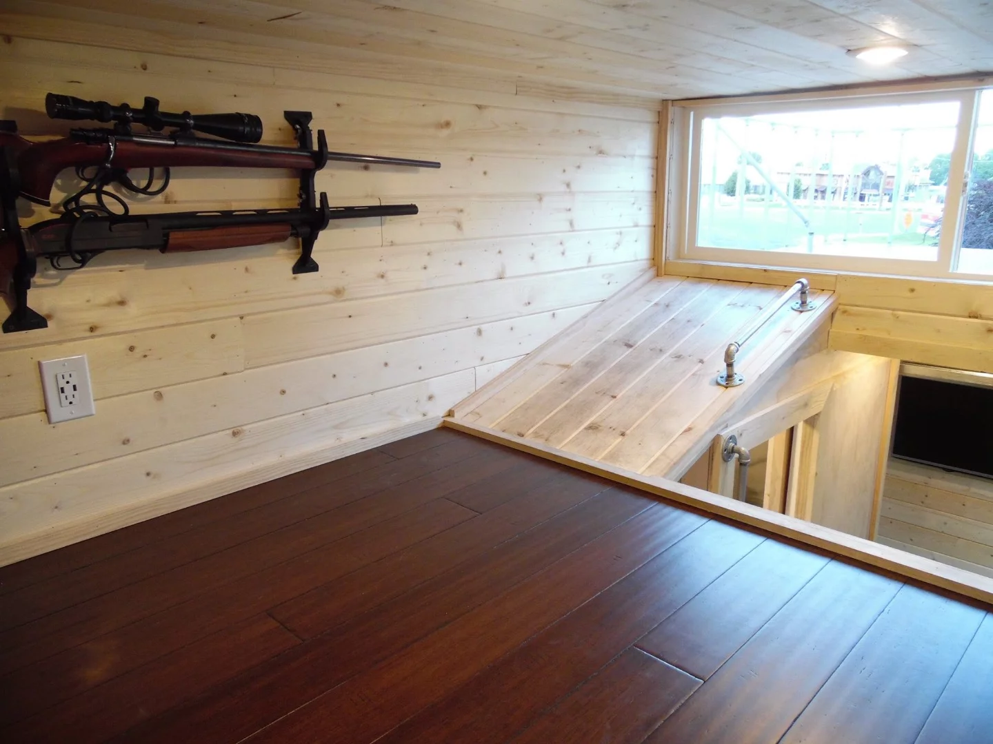 You can also access the deck from the loft, though from the photos it looks like you'd need to slide across on your stomach