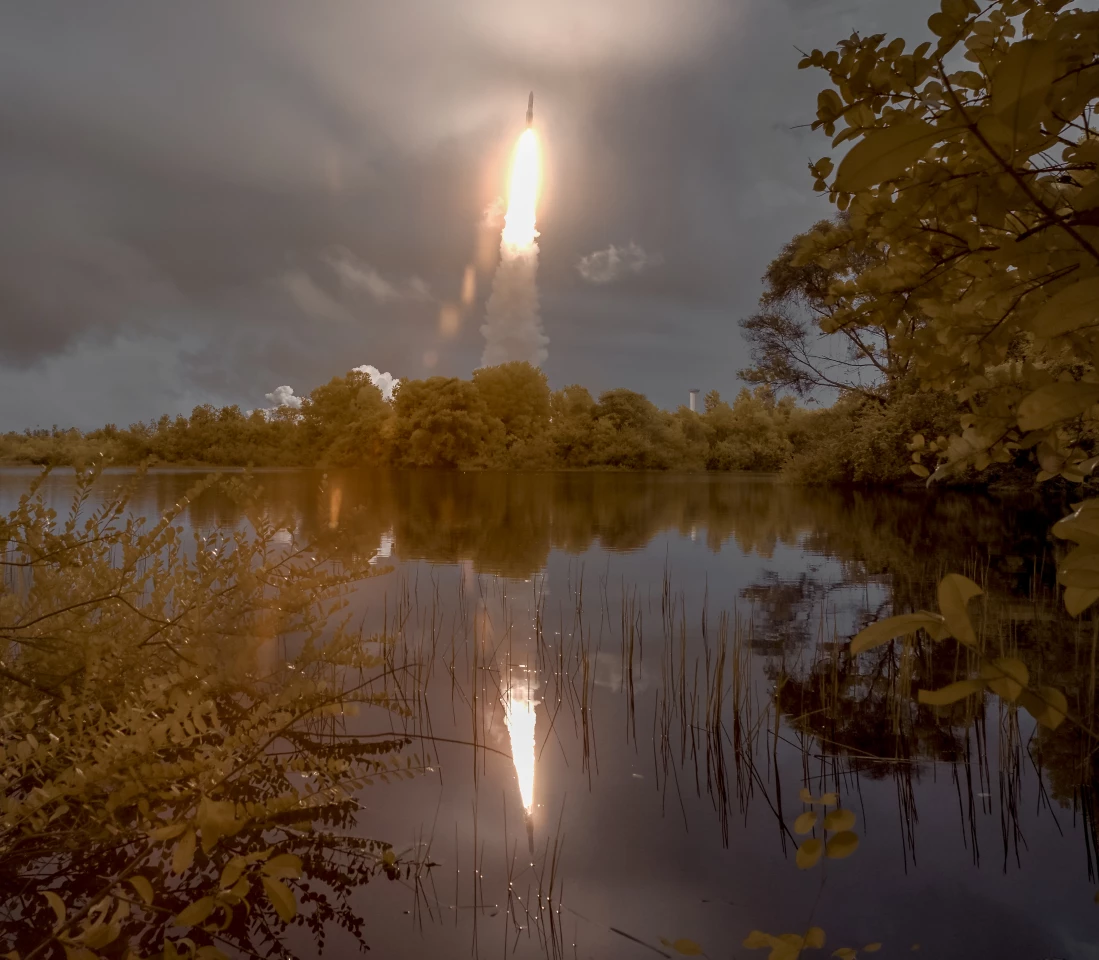Arianespace's Ariane 5 rocket seen in this false color infrared exposure as it launches with NASA’s James Webb Space Telescope onboard