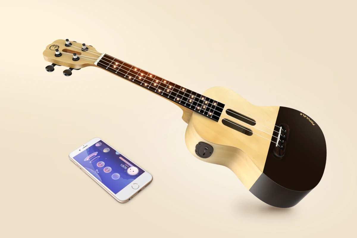The Populele connects via Bluetooth to a smart device running a learning app, which lights up finger positions on the fretboard to teach chords and songs