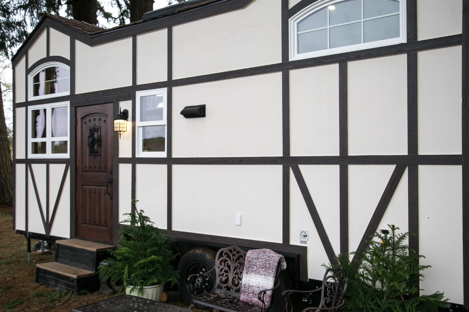 The Tudor-style tiny house is based on a triple-axle trailer