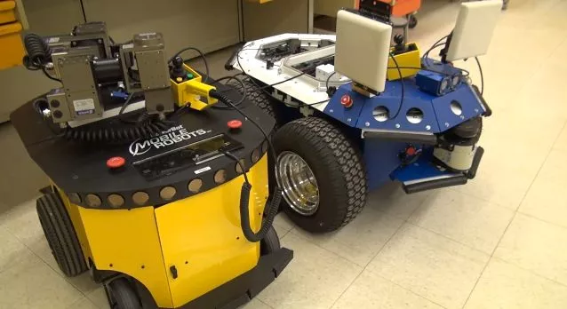 The system would include mobile robots, for delivering and retrieving instruments