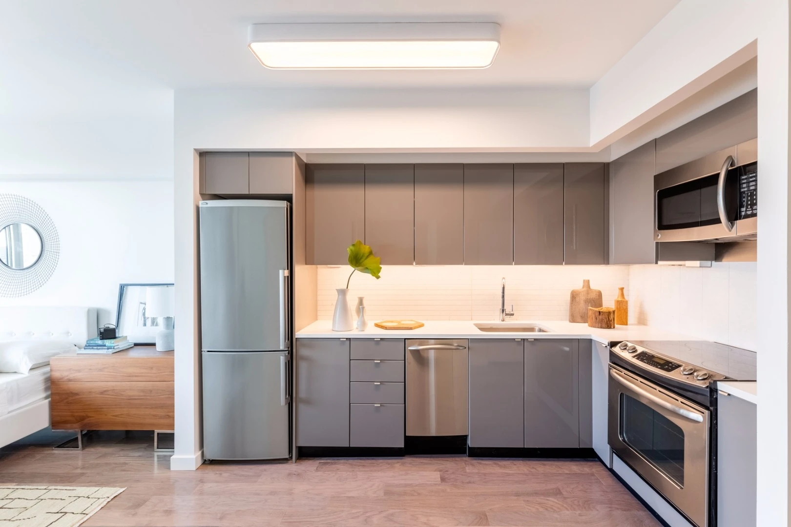 The apartments at 461 Dean feature Caesarstone countertops, stone backsplashes and stainless steel appliances