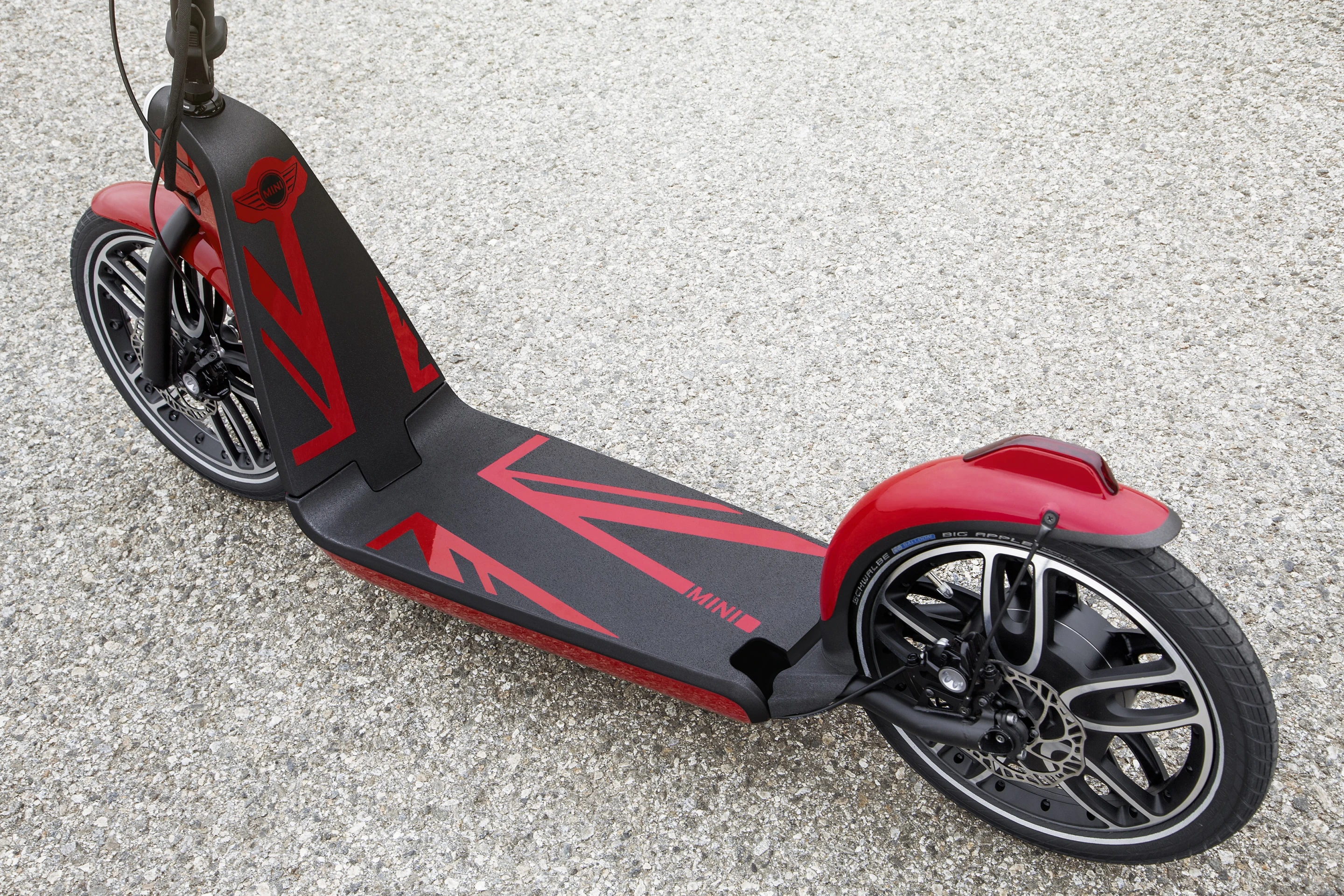 BMW says that the Mini CitySurfer concept would be compact enough when folded up to be carried on buses and trains or thrown in the back of the car