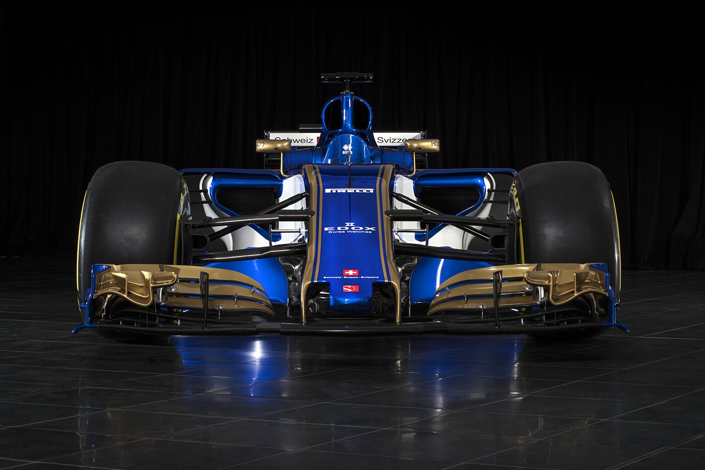 The bigger wings and wheels on the C37-Ferrari are a result of the new regulations for F1 cars