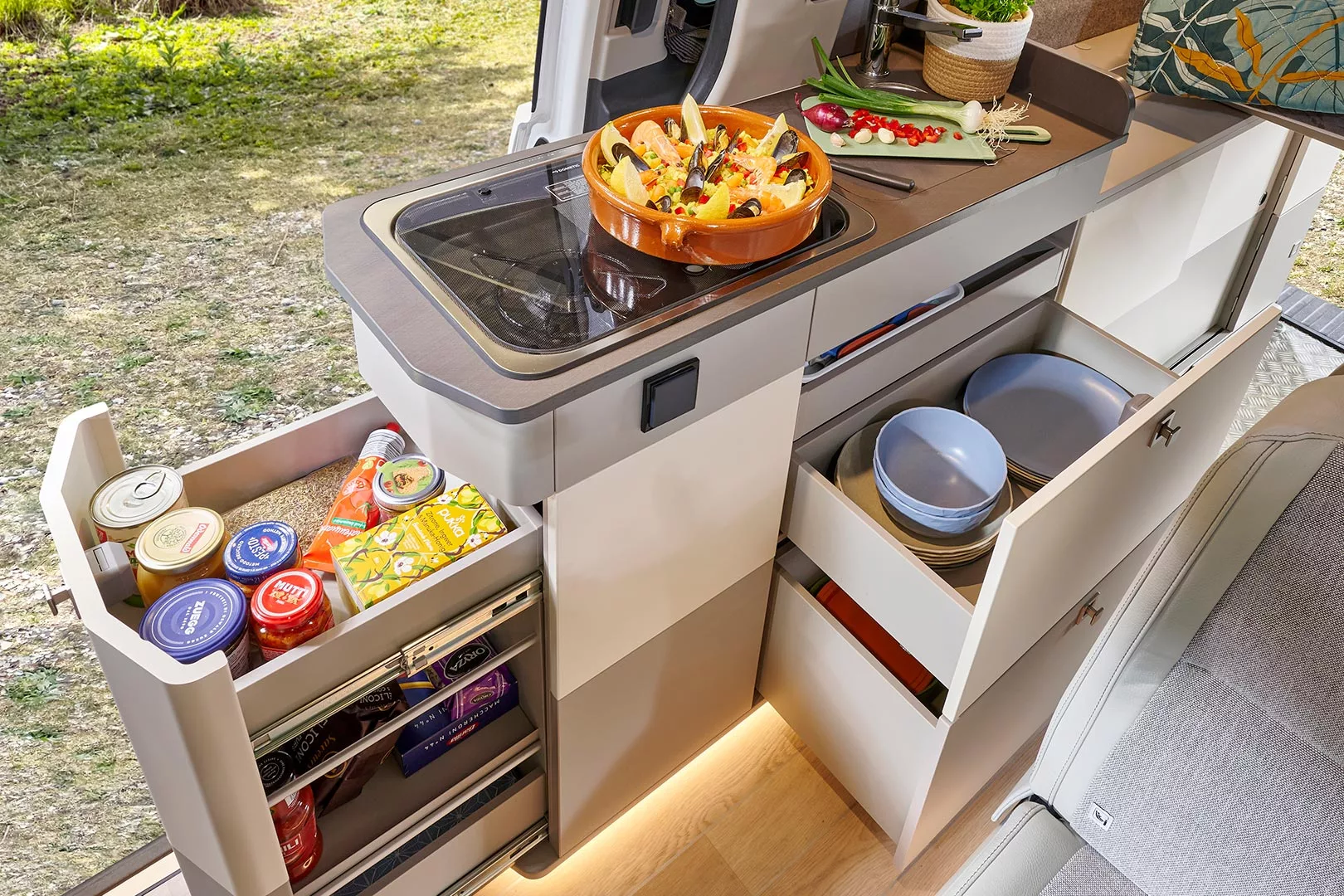 We'd still probably prefer the indoor/outdoor slide-out fridge in that space, but the slide-out pantry is certainly handy, too