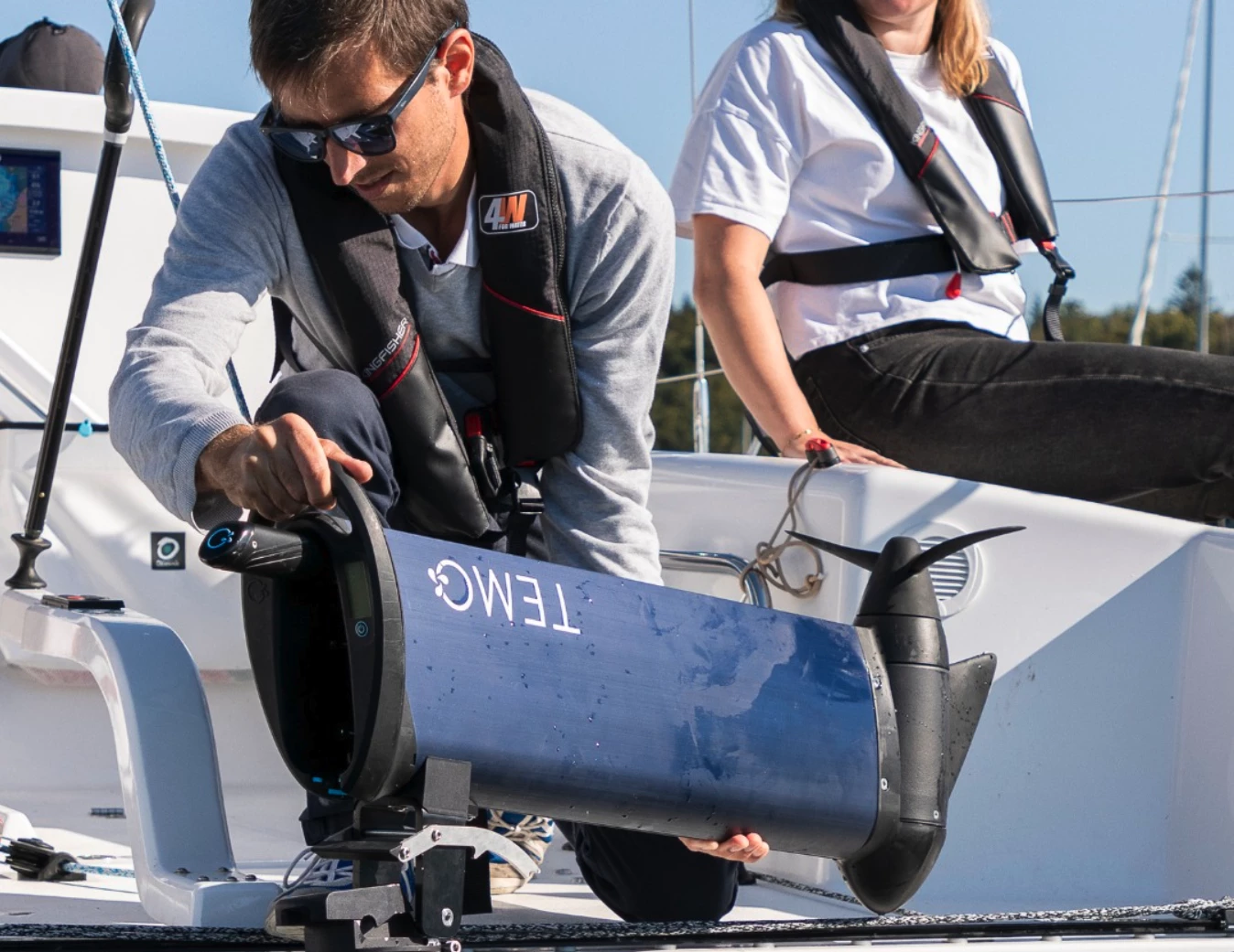 At 35 lb, the compact Temo 1000 can be readily removed from and reinstalled on the boat each trip while the mounting bracket remains clamped to the transom; note the tiller handle sticking out of its recessed position inside the outboard body