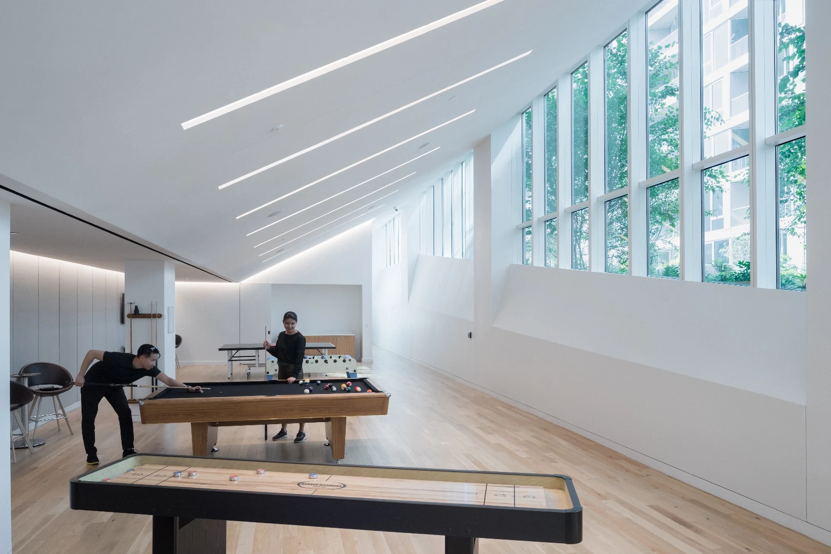Amenities include a pool table, reading rooms, gym, and party rooms