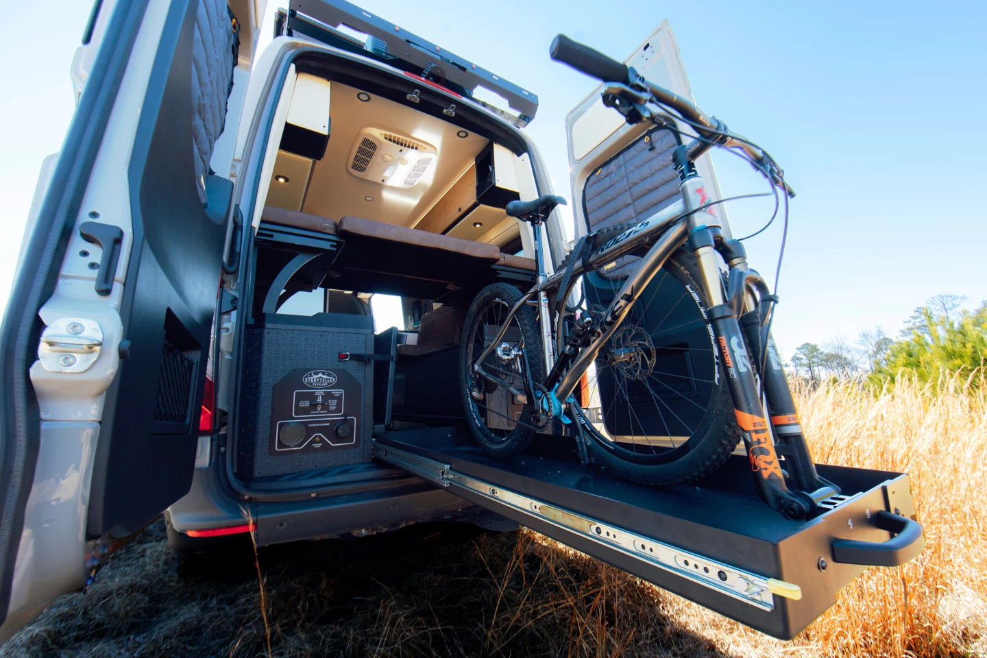 The Crew Mode comes with a trick hinged floor that flips over to reveal a 5-foot slide-out bike/cargo tray