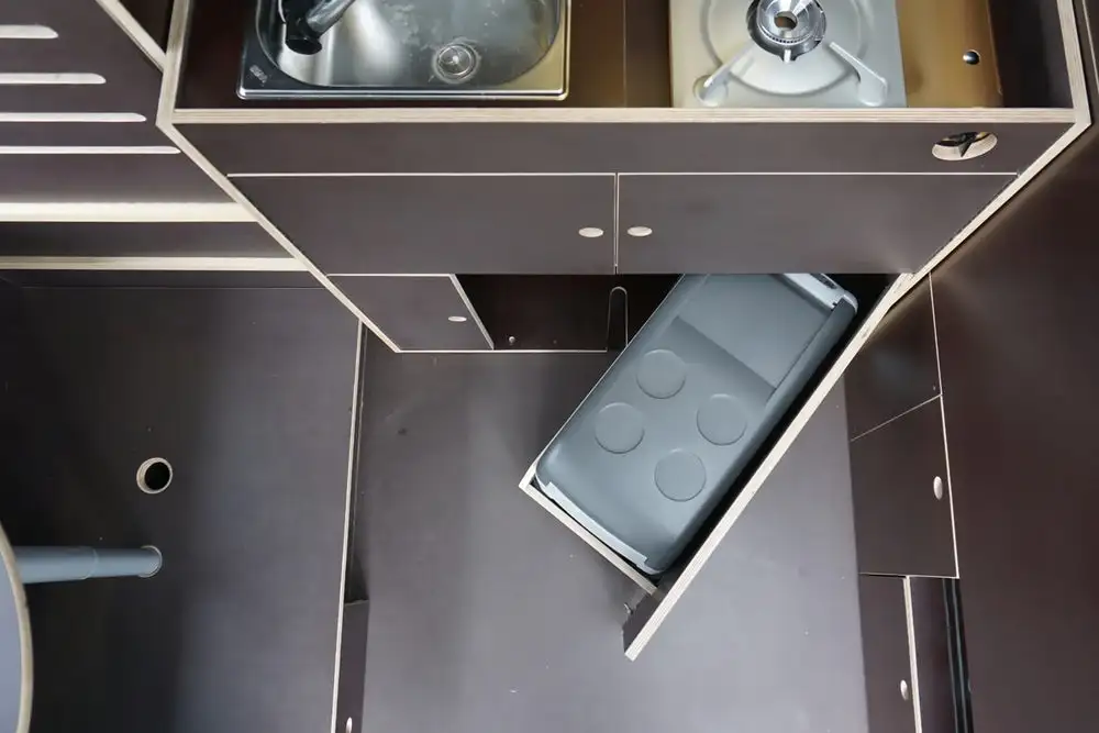 Swing-out fridge in the Vanjoy's slim kitchen block