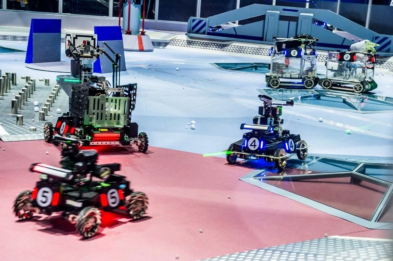 The object of a RoboMaster battle is to take out an enemy base using five types of robot, including battle bots, drones and an armed base station