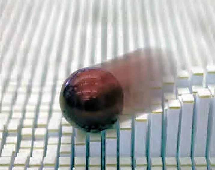 Image of a ball rolling down an incline made of the inFORM 3D pins (Photo: MIT)