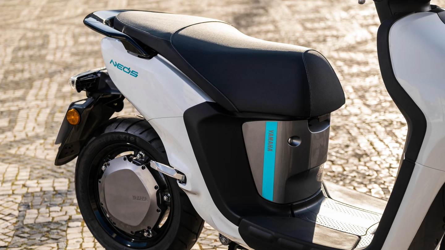 The 2022 Neo's electric scooter's direct-drive hub motor is bolted to a rear-cast rim that's wrapped in a 130/70 low-resistance tire