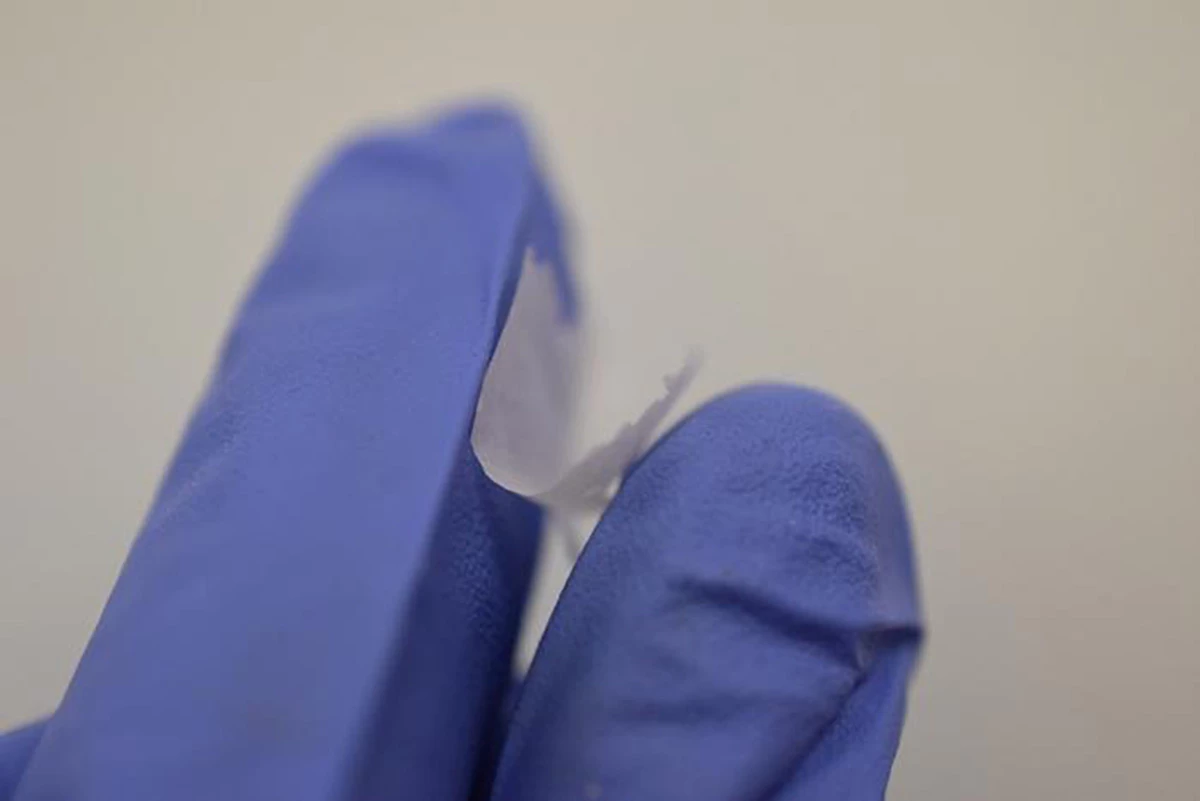 The nanofiber mat held between two fingers