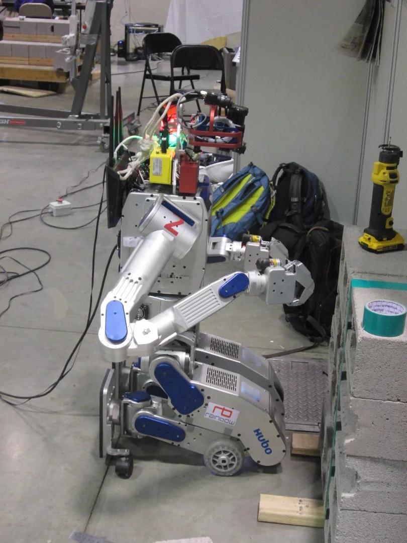 KAIST's DRC-Hubo kneeling on its wheels