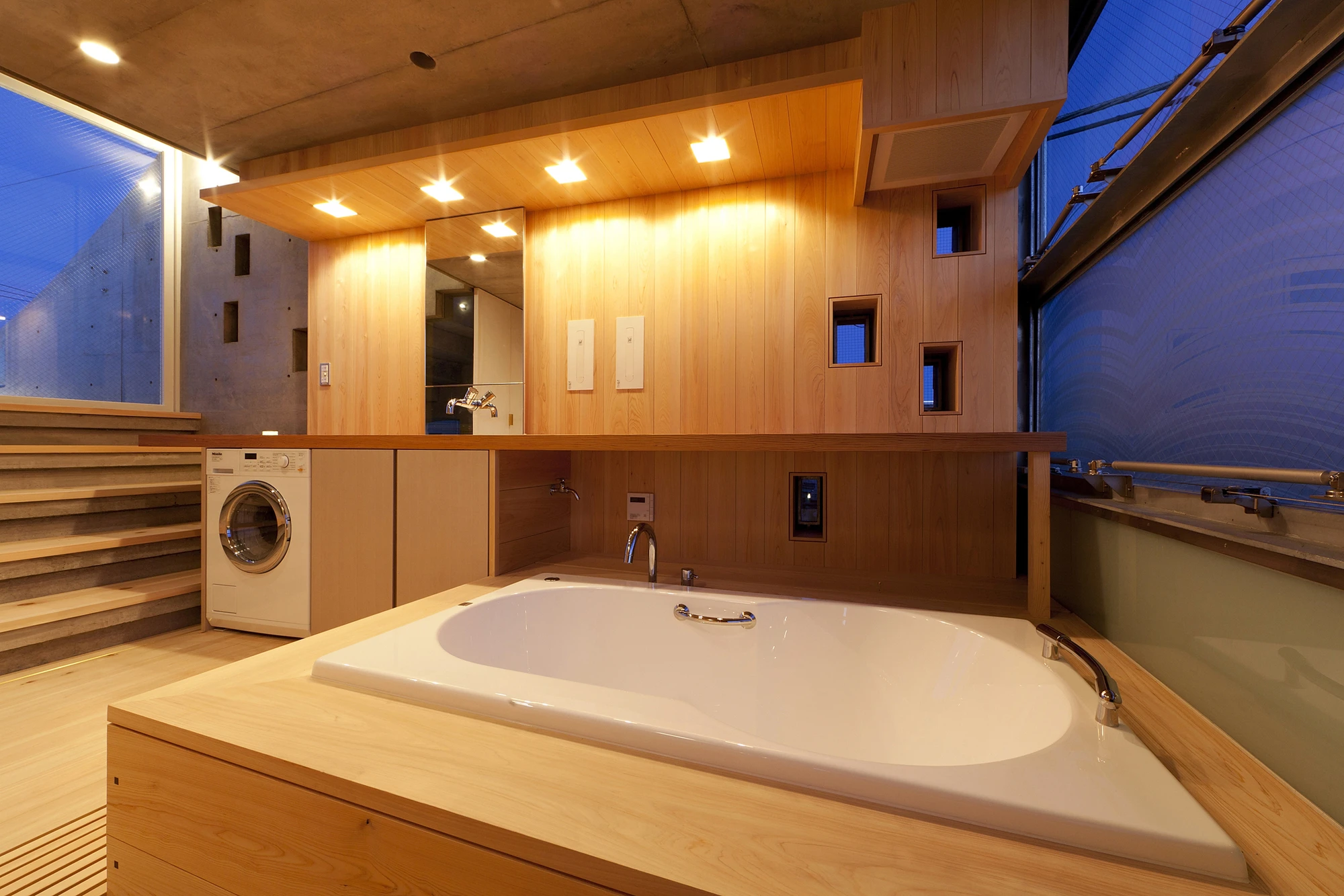 The house sports space-saving measures like placing the washing machine in the bathroom (Photo: Yuji Nishijima)