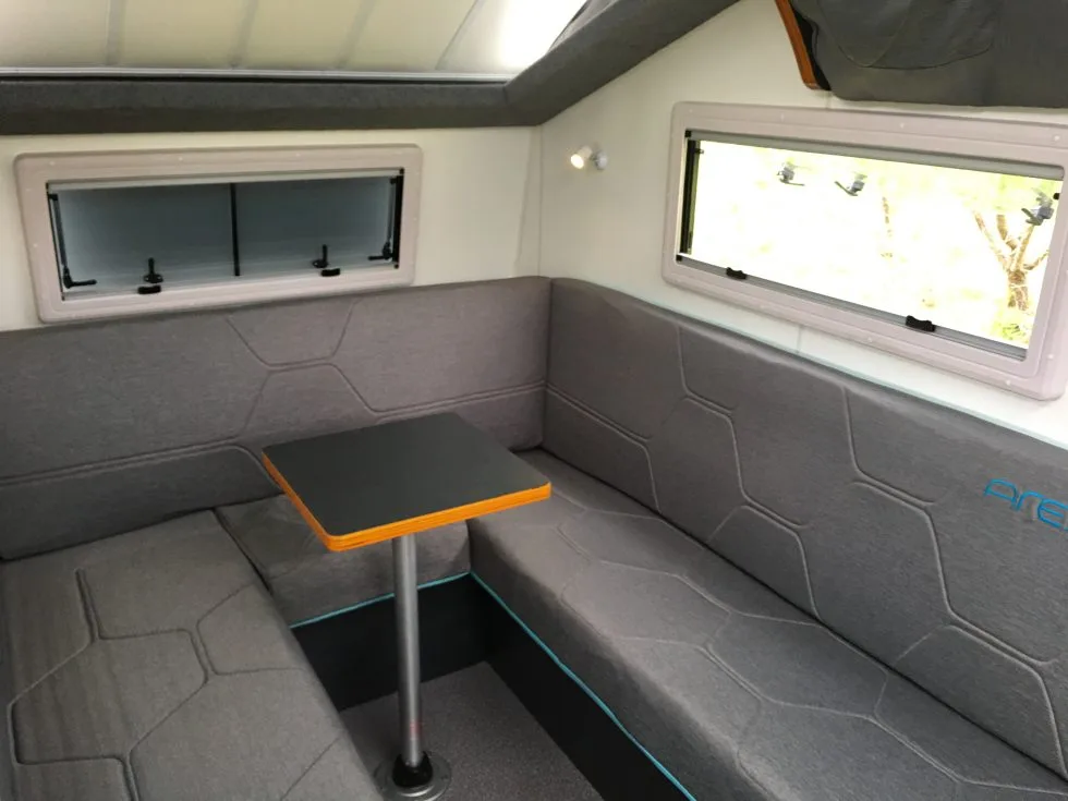 Inside, the Ares offers a convertible lounge/bed and loft kids' bed
