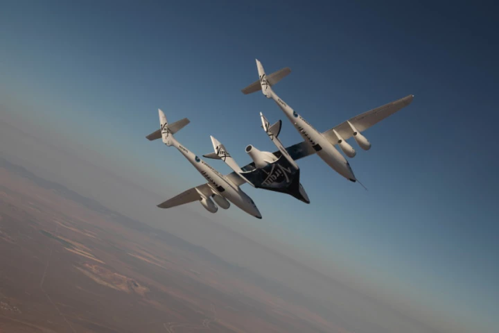 VSS Enterprise on its first manned flight attached to VMS Eve