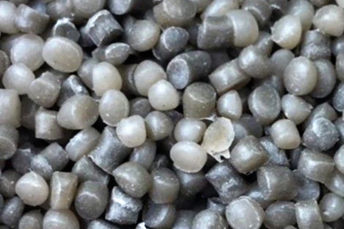One product of recycling wind turbine blades is these reinforced plastic pellets, which can be used to manufacture durable products like maintenance hole covers