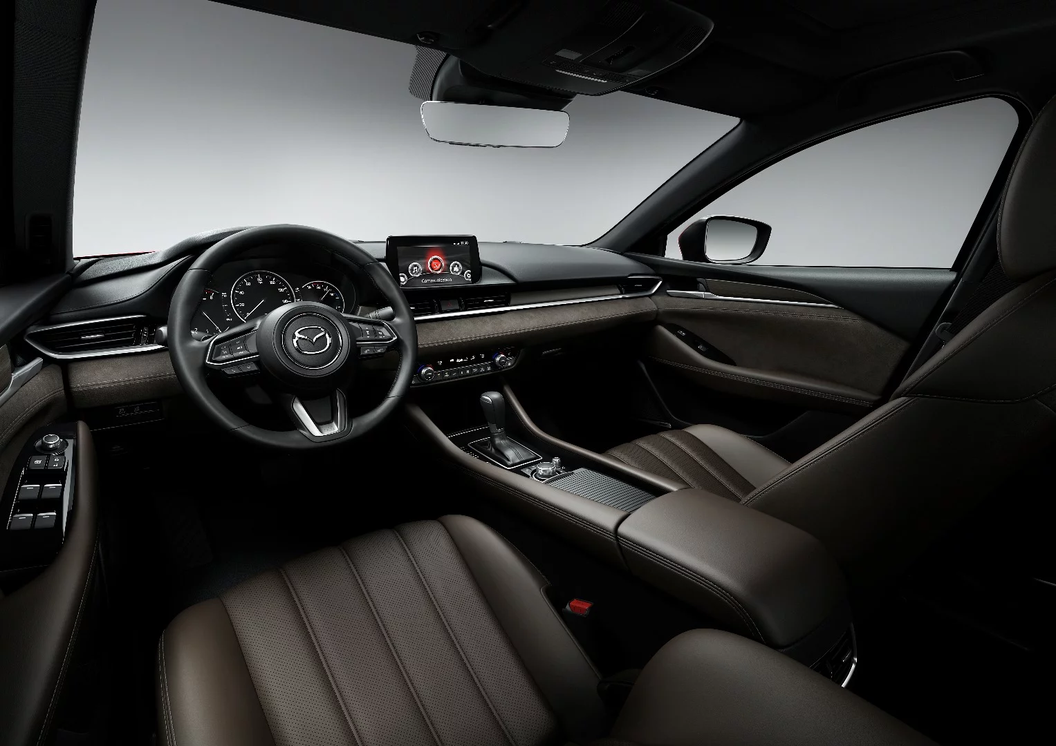 The Mazda 6's interior is all new for 2018, with the use of exotic materials and new tech