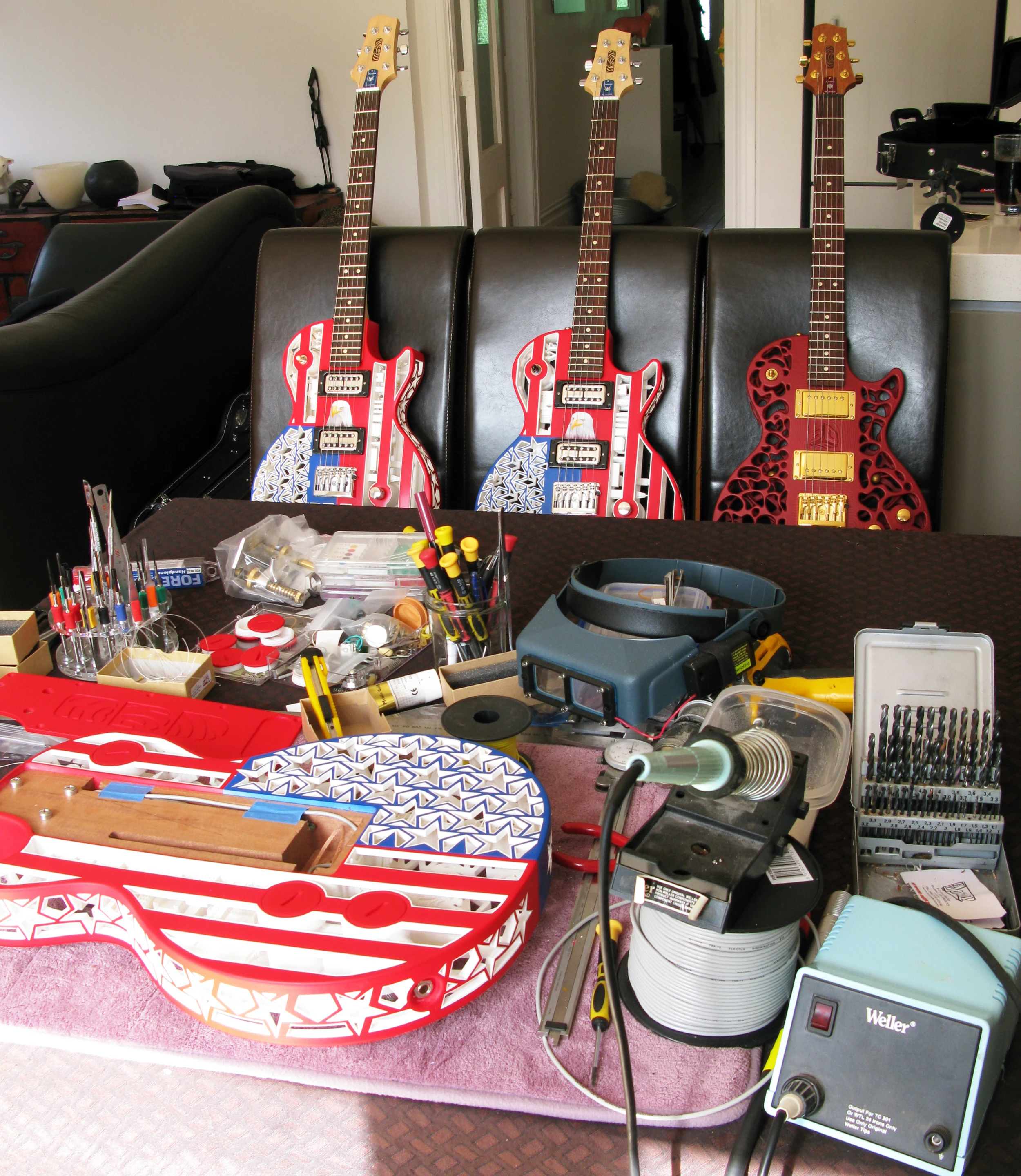 Models being assembled, and guitars ready to be shipped out