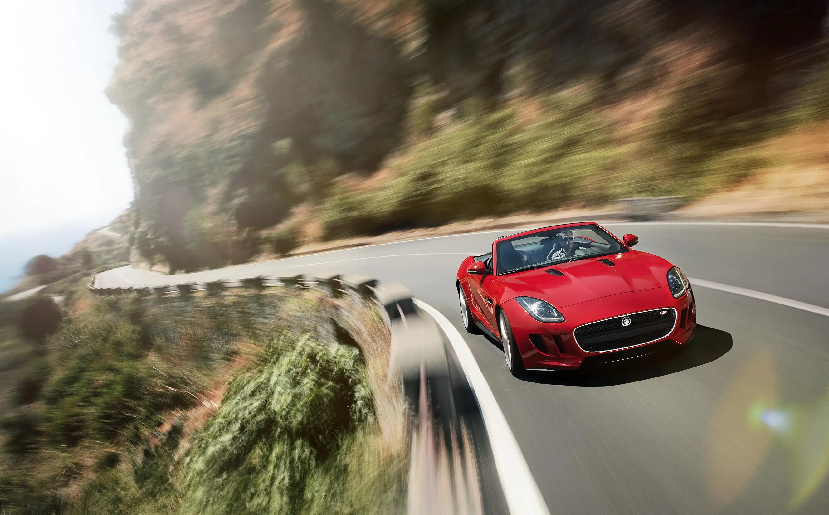 The V-8 F-Type has close to 500-hp