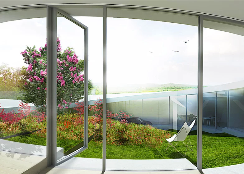 The main body of the house takes the form of a loop, creating a private central courtyard (Image: BIG)