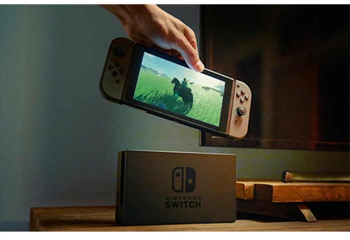 The Nintendo Switch can be placed in a dock at home to use the power of a big TV, or taken out and played on the go