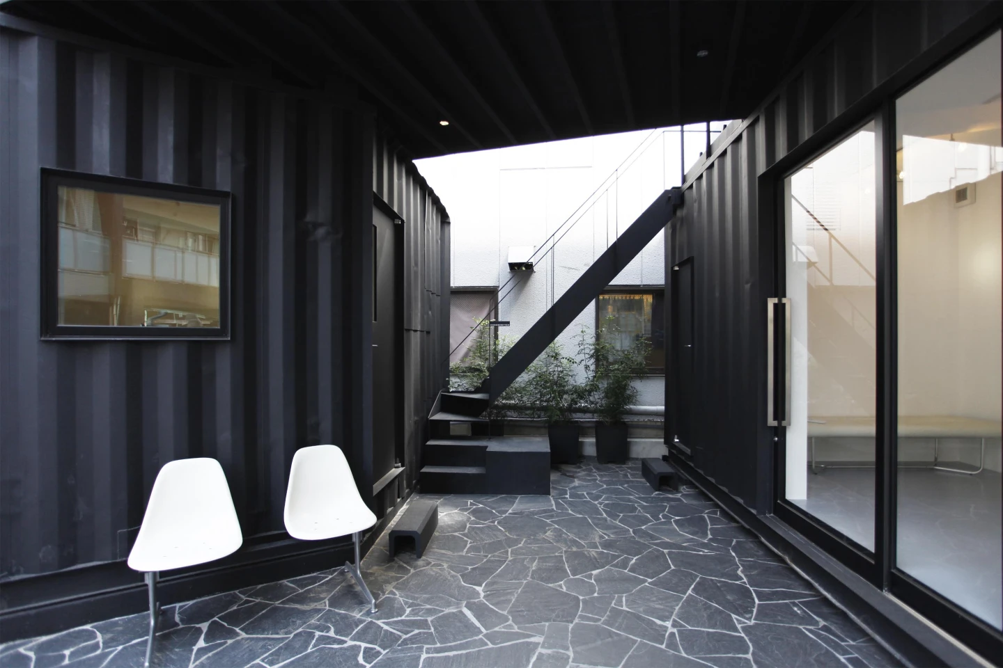 These two small rooms face in towards each other and are connected via a central exterior courtyard