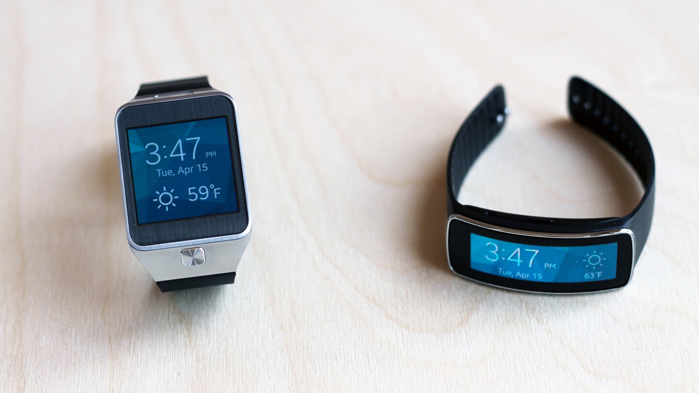 The Gear 2 next to Samsung's fitness tracker, the Gear Fit
