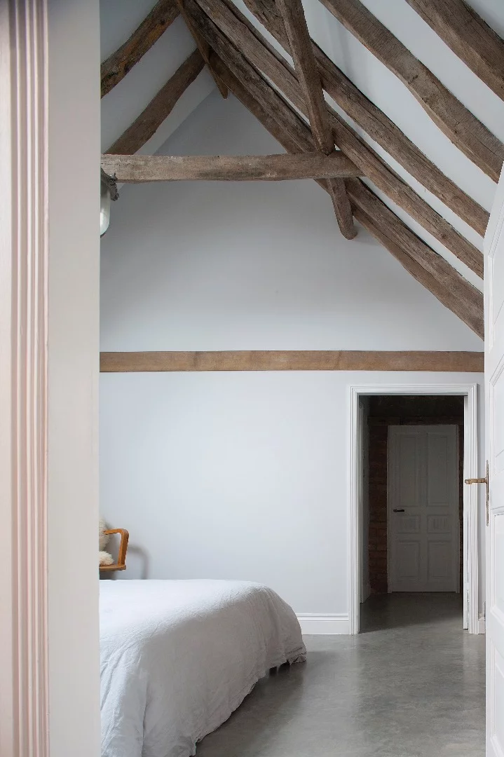 The home's interior is dominated by exposed wood and stone but this belies the effort that went into keeping things "original"