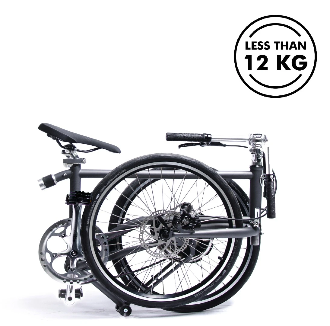Drop the adjustable seat and handlebars down into fully folded, suitcase-ready form