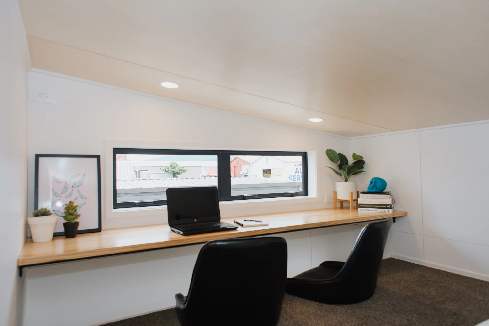 Cyril the Tiny House's secondary loft is used as a home office, though can also serve as a guest room if required