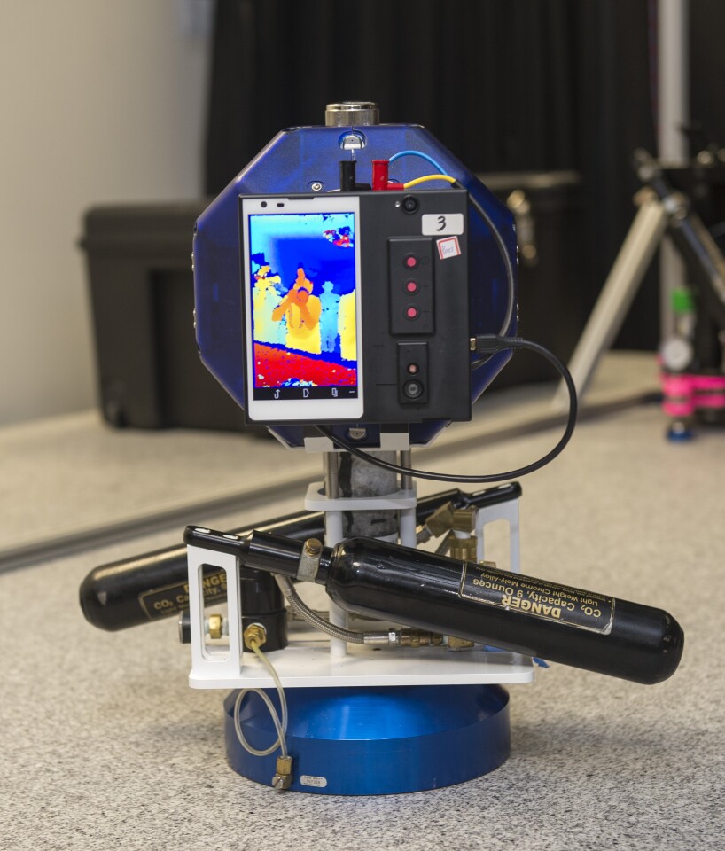 Equipped with depth sensing, motion tracking cameras and computer vision software, Google's Project Tango smartphone will help the SPHERES navigate the ISS (Photo: NASA Ames / Eric James)