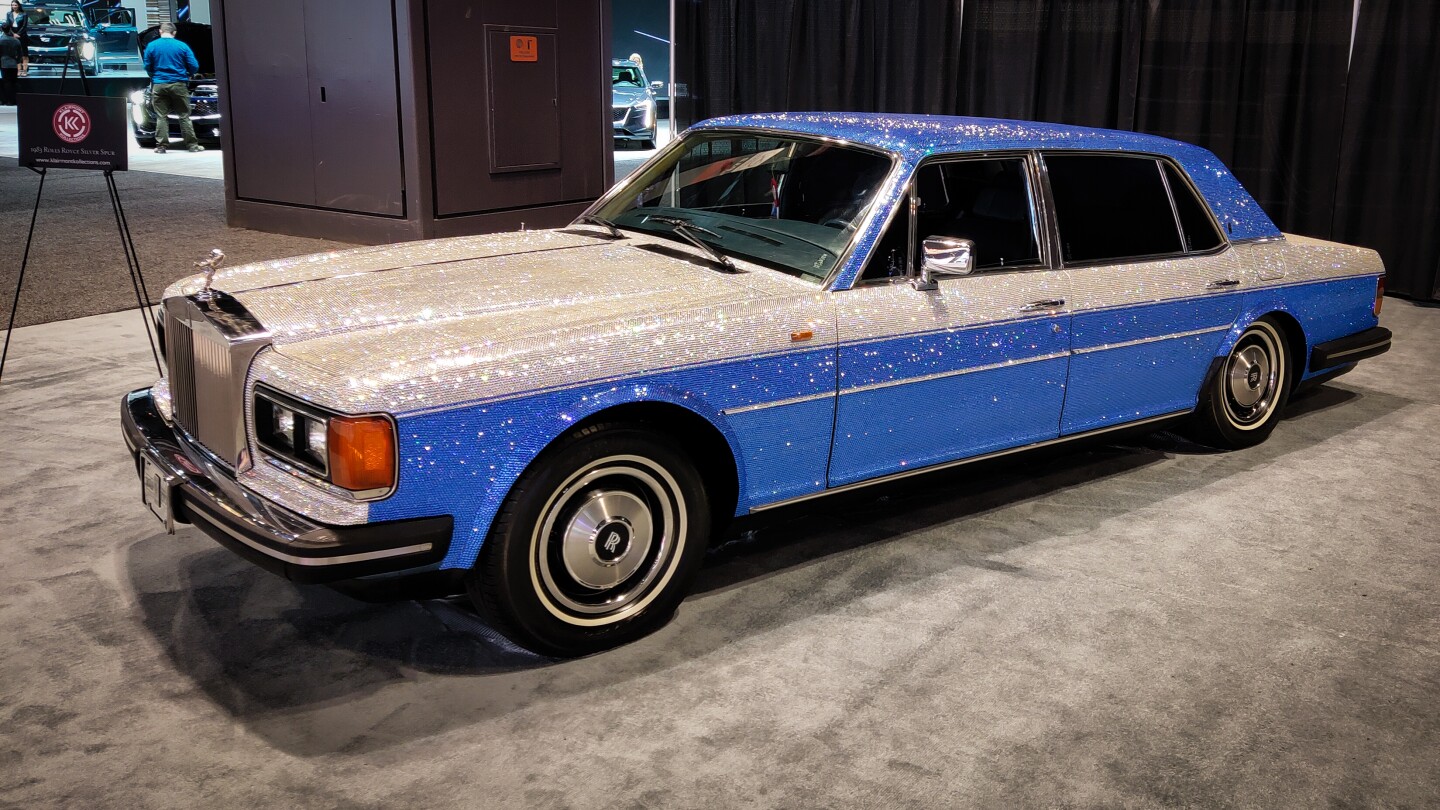 This gem-encrusted 1983 Rolls Royce speaks to everyone's inner Liberace, sparkling from every angle