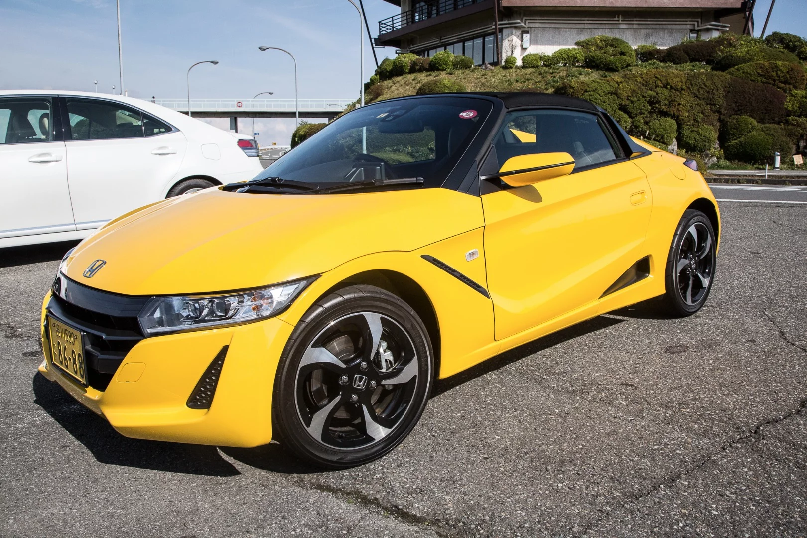 Honda's designers took clear inspiration from the Honda Beat when penning the S660's front end