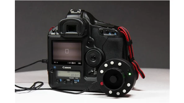 The Okii Systems USB Follow Focus works with many Canon EOS DSLRs (shown here with the EOS 1D Mk IV)
