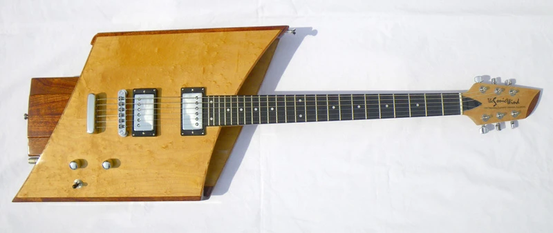 The maple through neck is topped with a 1.7-inch wide (at the nut) ebony fingerboard with 24 jumbo frets