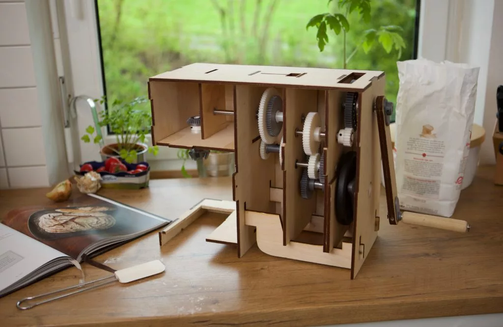The Pino kitchen appliance incorporates a traditional crank drive and flywheel