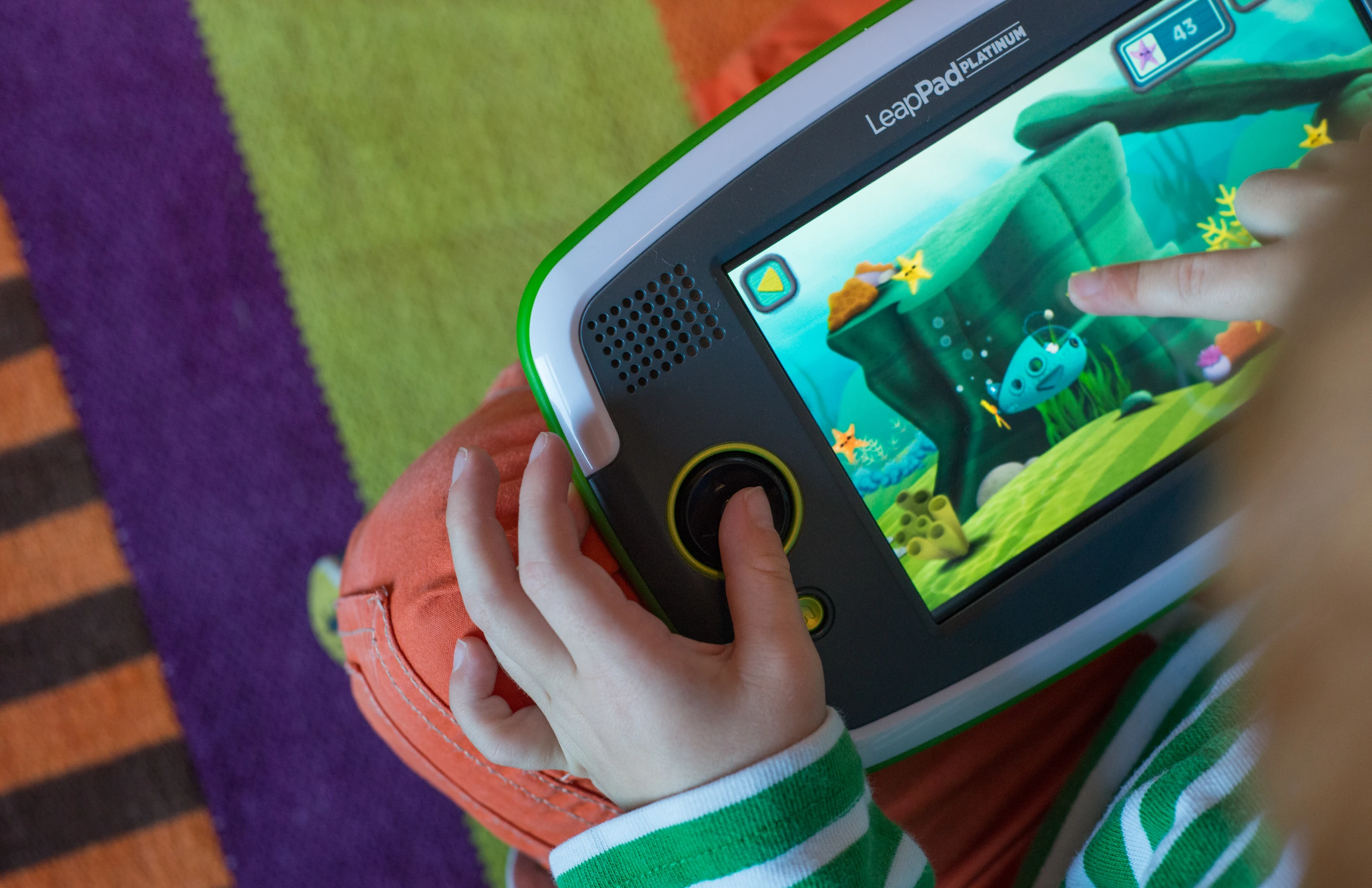 The LeapFrog LeapPad Platinum has a touchscreen and a D-pad for controls