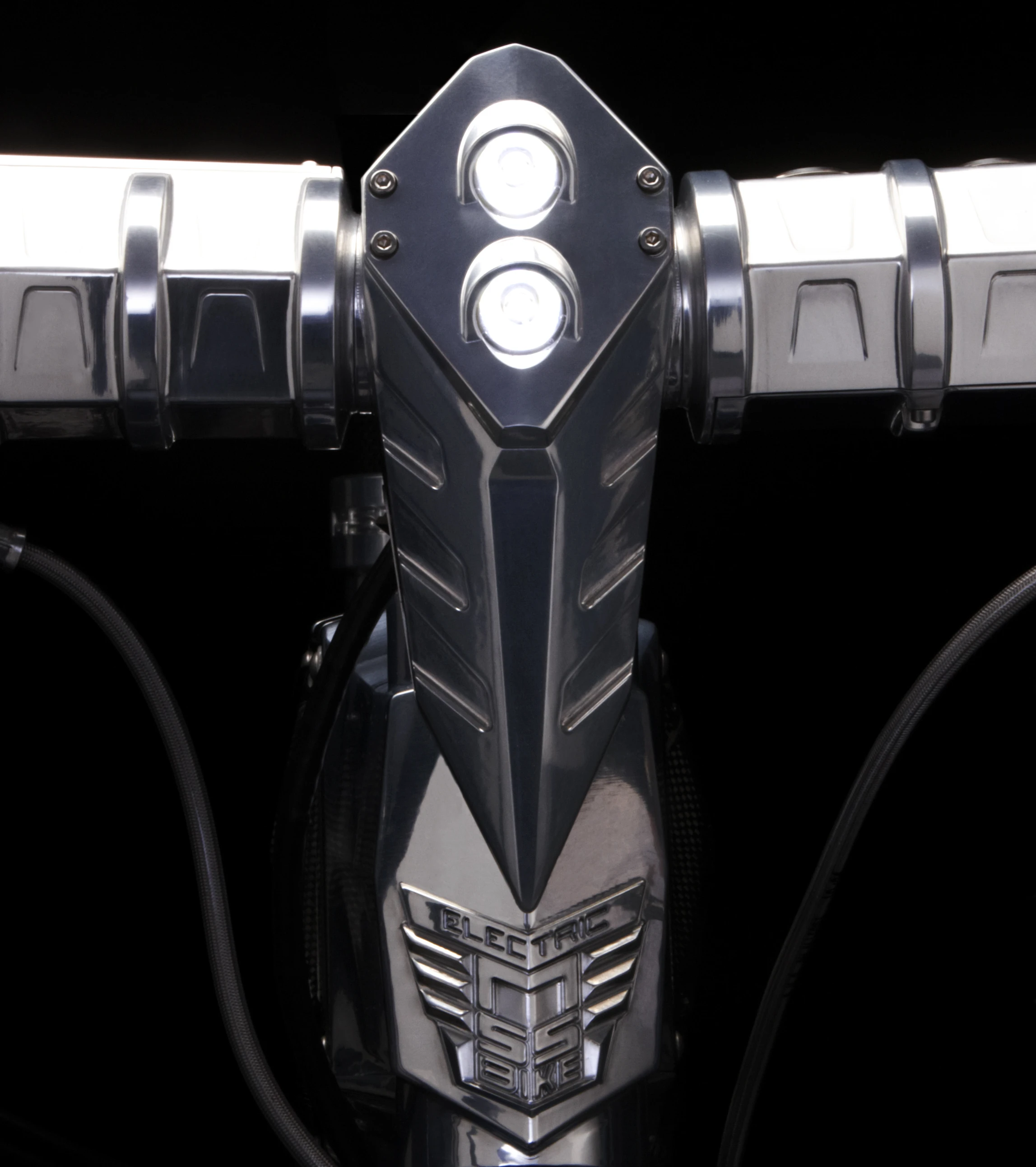 The handlebar and stem features a built-in LED headlight
