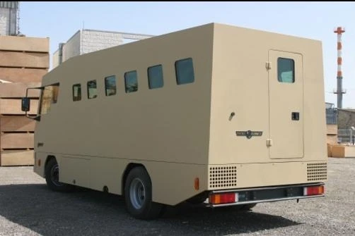 one door at the back, one at the side, and another emergency door on the roof.