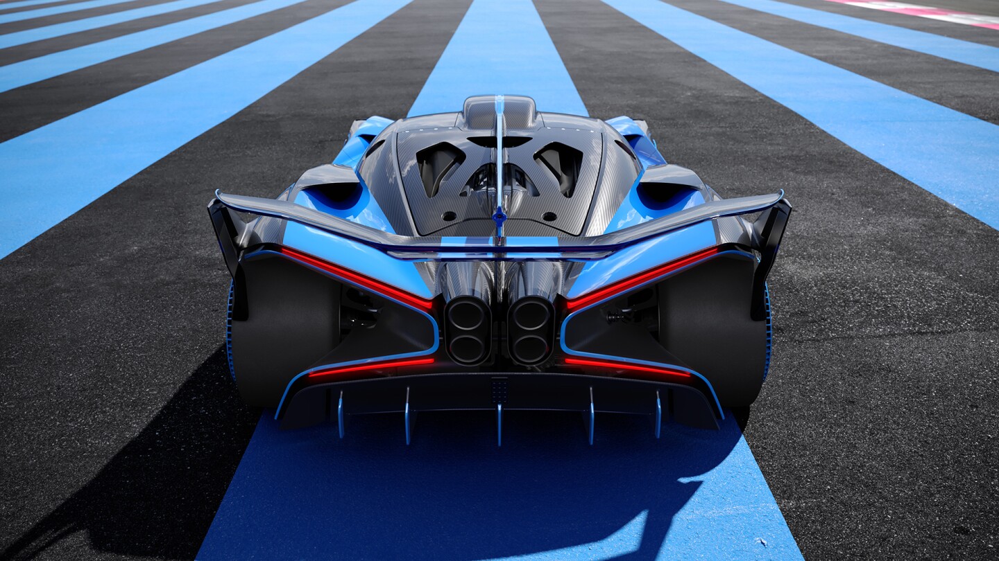 The Bolide rear-end fuses together a centralized quad exhaust, adjustable wing, diffuser and X-shaped bodywork and lighting