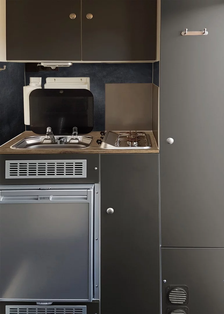 Each Sportcaravan Cube includes a kitchen, along with sleeping space and seating for four people