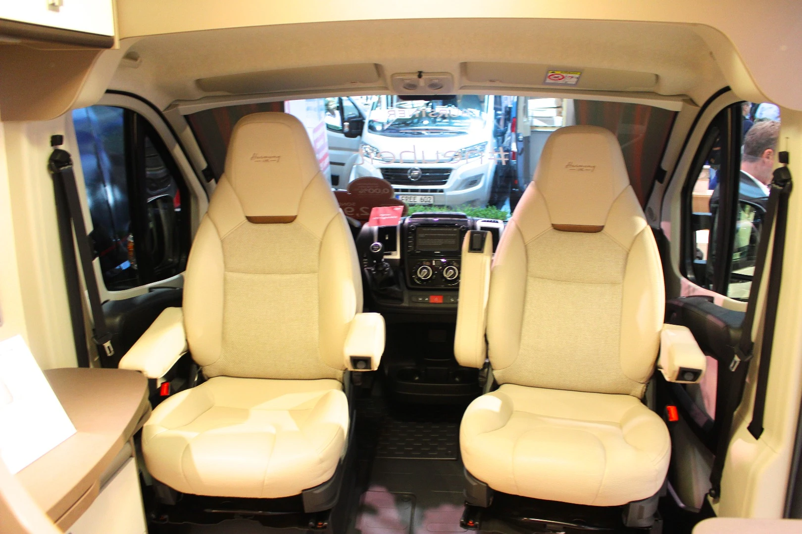 The swiveling cab seats create a dining area for two inside the Bürstner City Car Harmony Line C 603