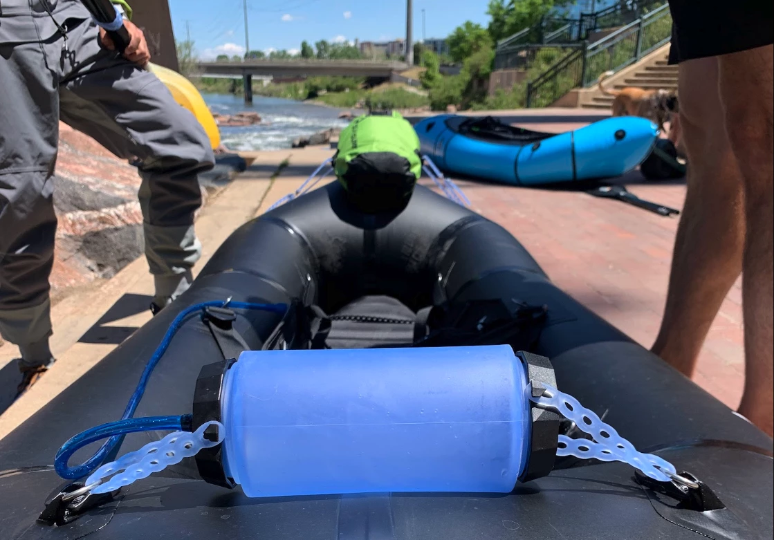 Strapping down gear for a packraft launch