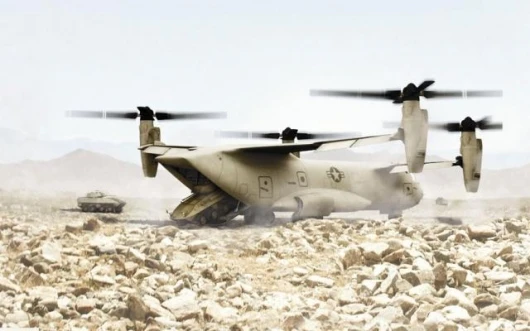 An artists impression of the Quad Tiltrotor delivering Strykers into the desert