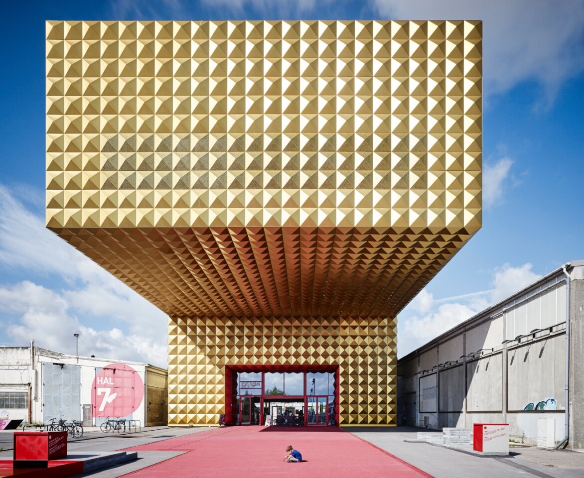 Ragnarock - Museum of Pop, Rock & Youth Culture, in Roskilde, Denmark, by Michael Moser, is an AIA|LA APA Honor award recipient. "This is a traditional, classical, iconic building – and if not the building, certainly the image of it," says AIA's jury. "The huge, gold structure cantilevered out looks almost dangerously powerful, as if it’s going to crush a small child who is kneeling beneath it"
