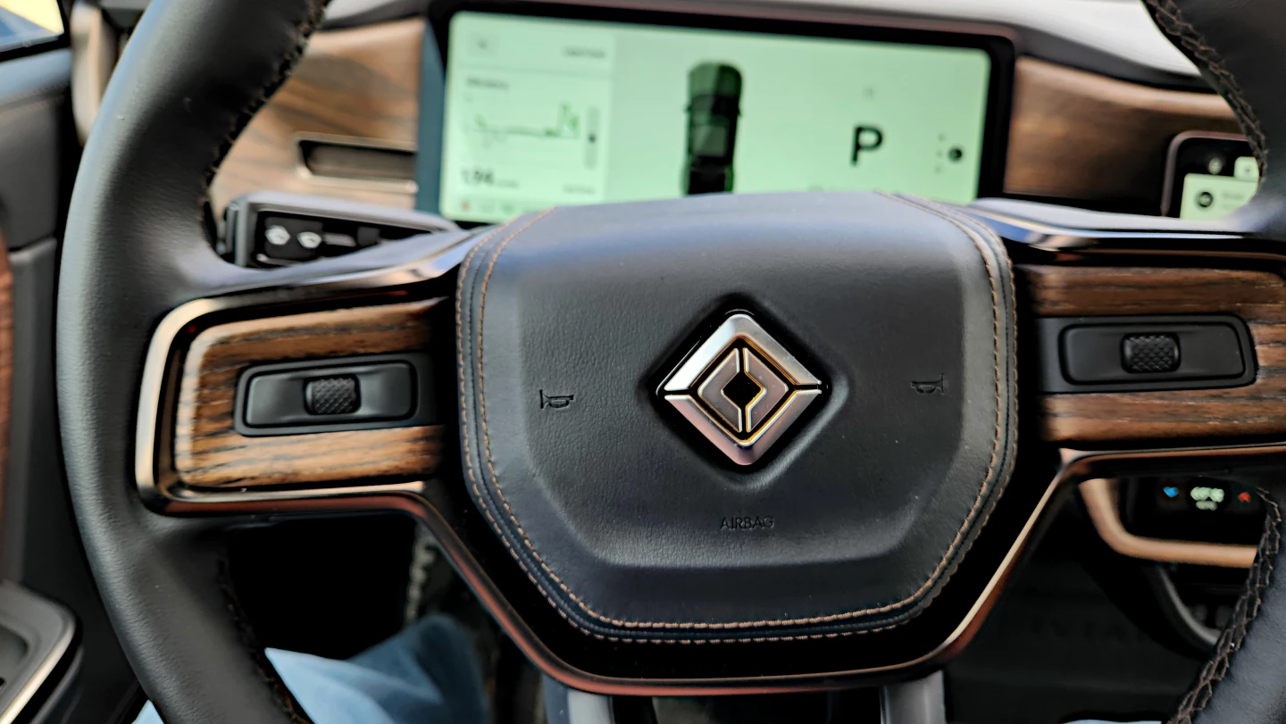 The controls to either side of the steering wheel are universal and their use will depend on what's selected on the infotainment screen